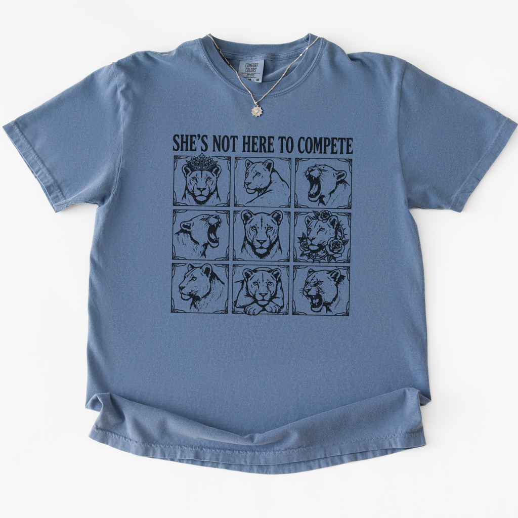 She's Not Here to Compete T-Shirt