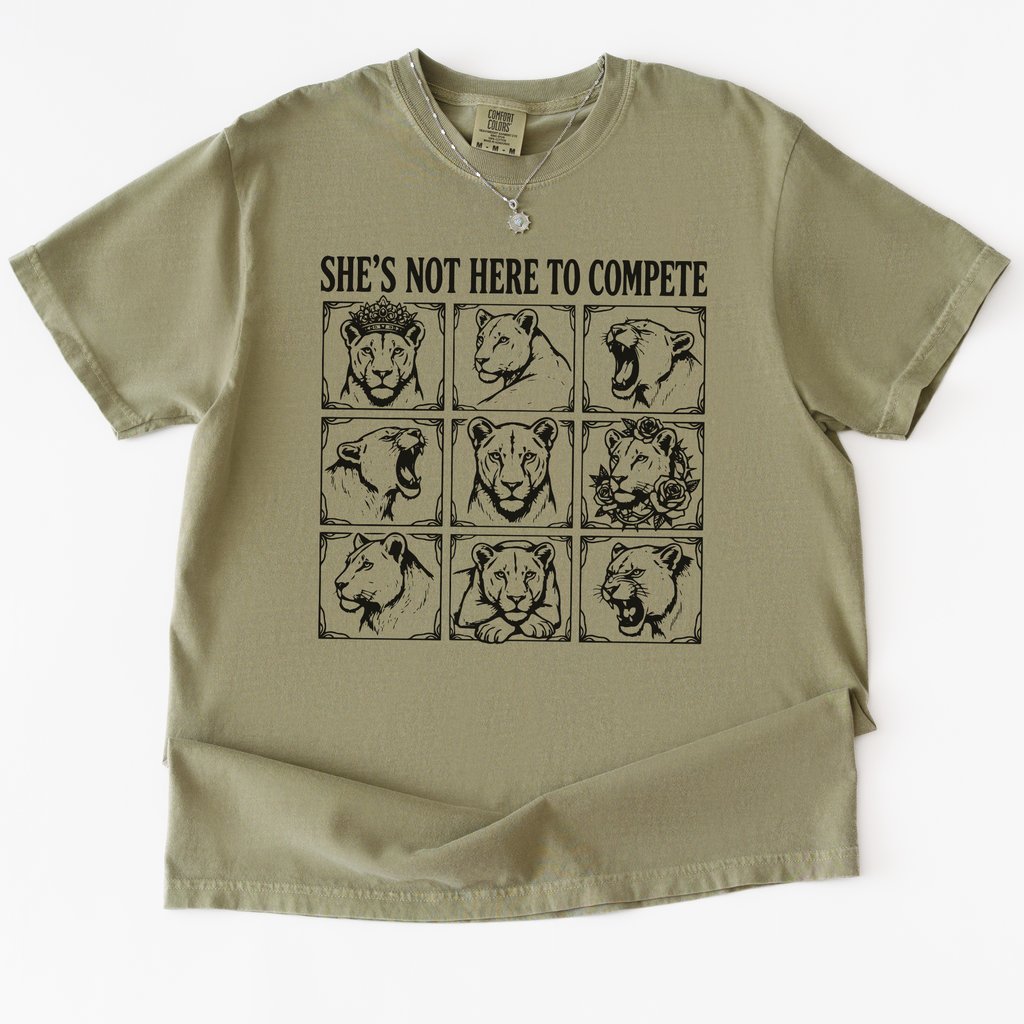 She's Not Here to Compete T-Shirt